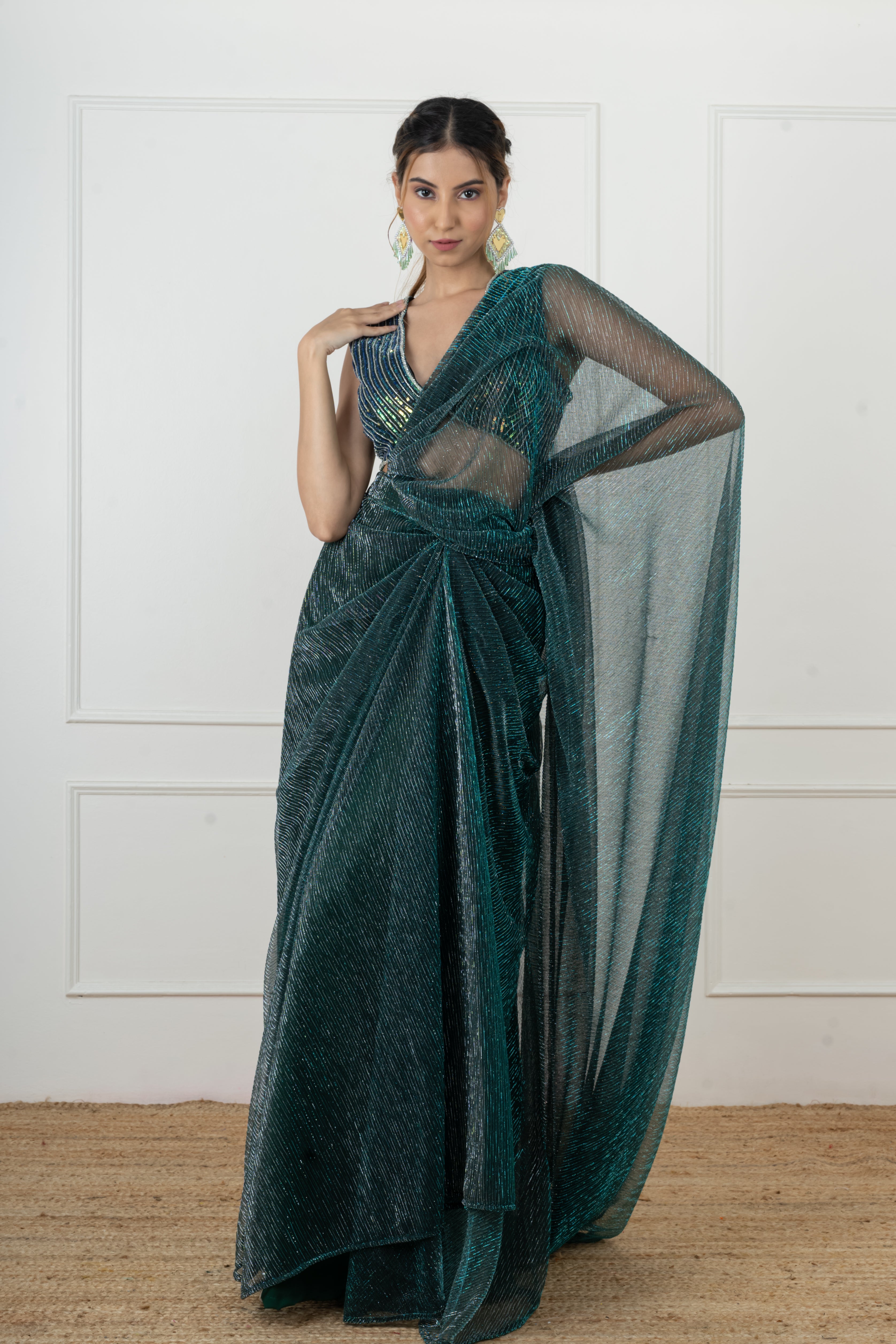 Bottle green draped saree